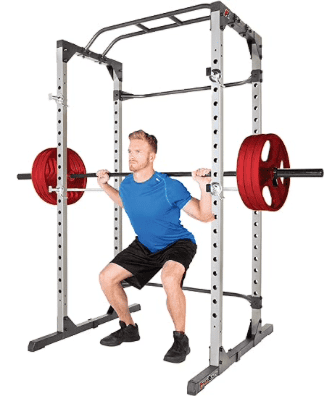 Bench and Squat Rack image with man actively squatting