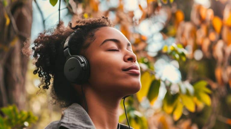 A female youth listening to motivational music to prep for a soccer game