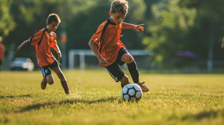 Youth soccer player practicing soccer ball handling drills.